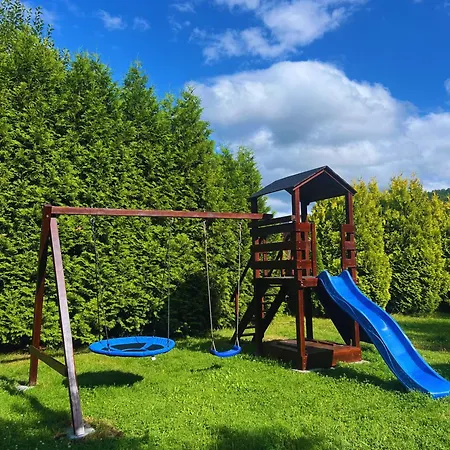 Dom Pod Swierkami Casa de Férias *