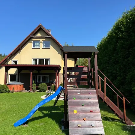 Dom Pod Swierkami Casa de Férias *